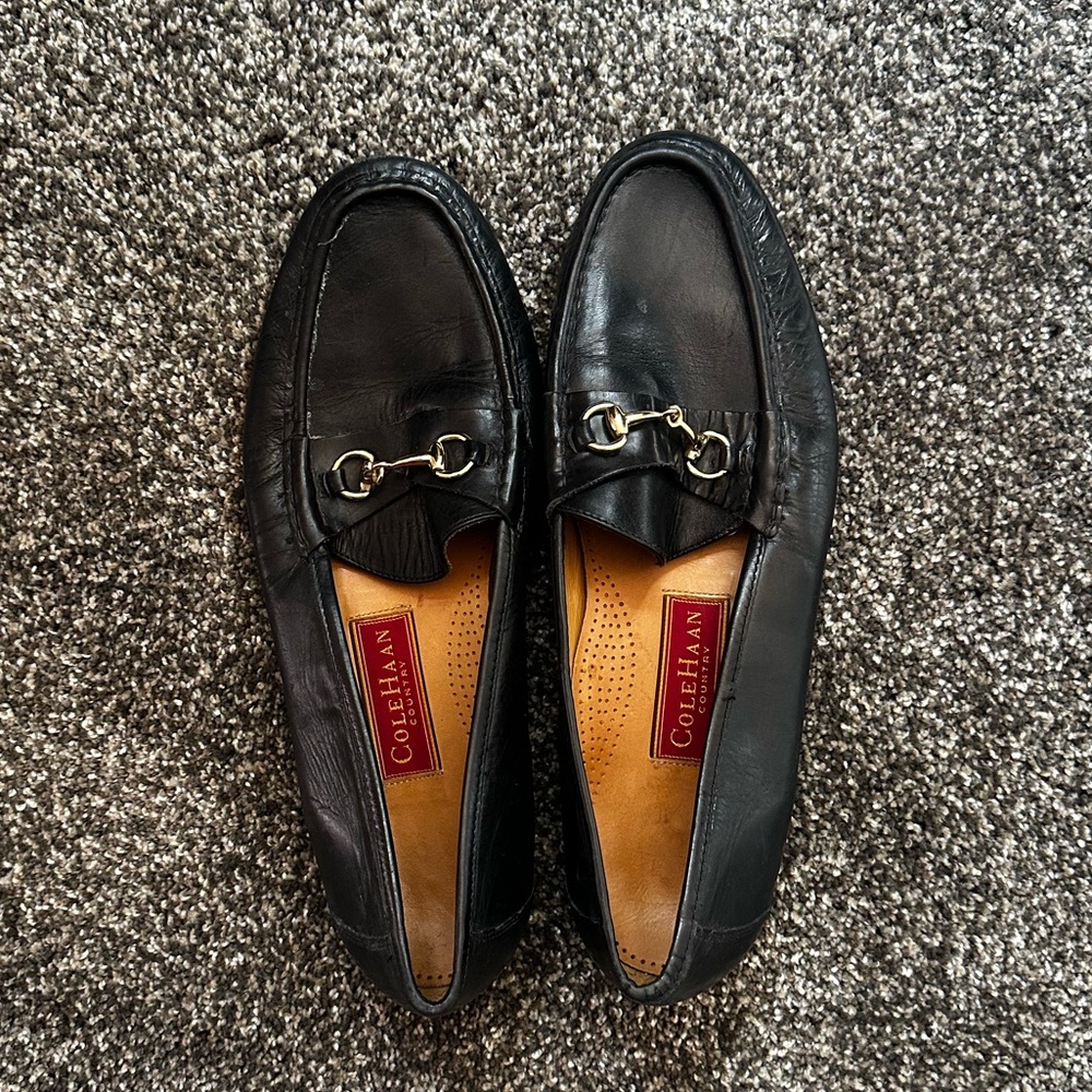 Cole Haan Black Leather Loafers with Slip-On Design
